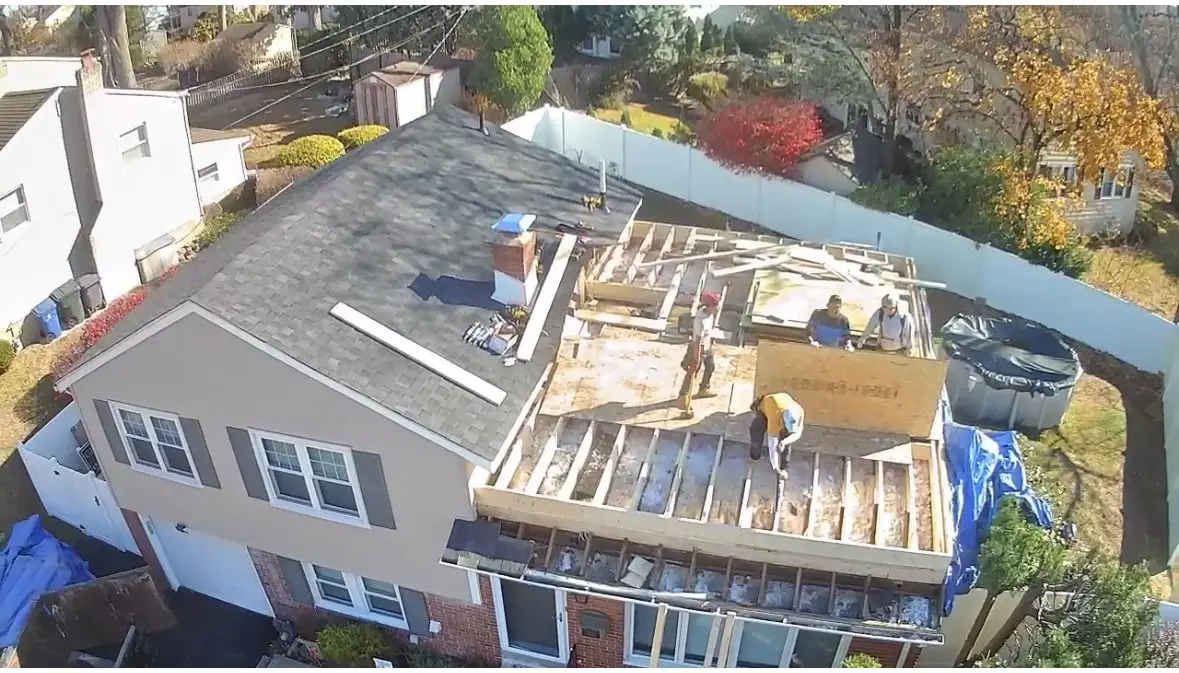 Aerial view of the crew framing the new third-story floor deck